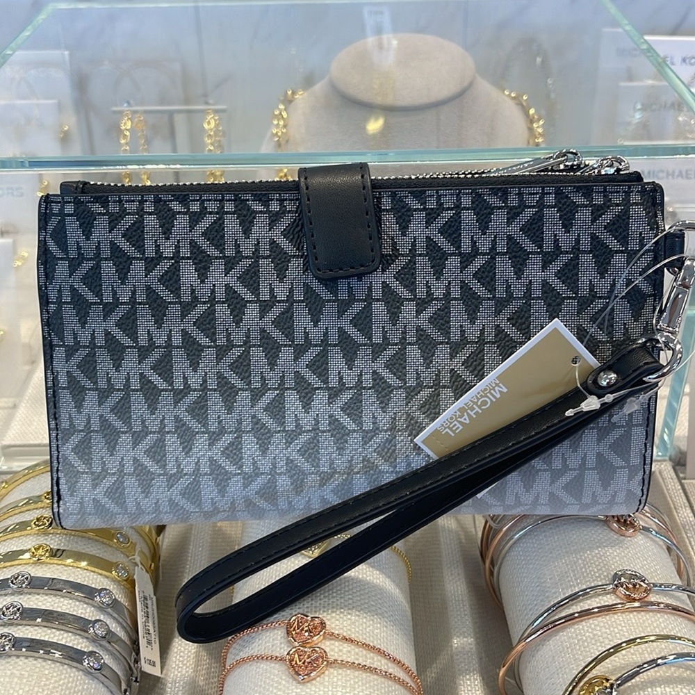 Michael Kors Jet Set Large Ombré Signature Logo Wristlet Wallet Phone
BLACK 
NWT - Picture 10 of 16